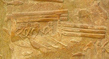 Rafts on a great river. Relief from Khorsabad. Louvre, Paris (France)
