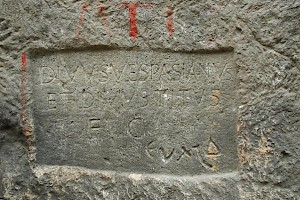 Inscription at the entrance of the tunnel: a dedication to Vespasian and Titus