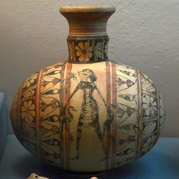Cypro-Archaic I Pottery (person holding two cranes)