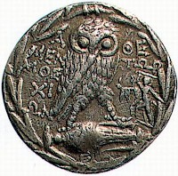 Athenian tetradrachm showing an owl and the statue of the Tyrannicides