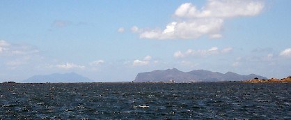 The Aegates Islands: Favignana (ancient Aegusa) to the right and  Maréttimo (Hiera Nesos) to the left in the distance.