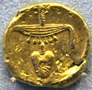 Coin of Nectanebo II, showing hieroglyfs signifying “nefr nub”, good gold