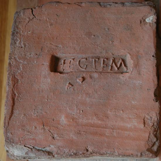 Tile with inscription LEG I F M (Legio I Flavia Minervia)