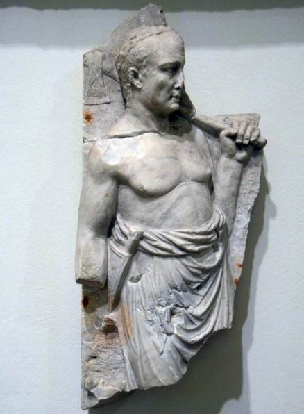A Roman sacrificer preparing to kill an animal
