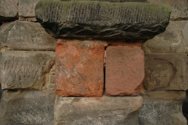 Trier, Porta Nigra, repairs: red stones in a black gate