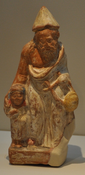 Pella, Figurine of a paidagogos