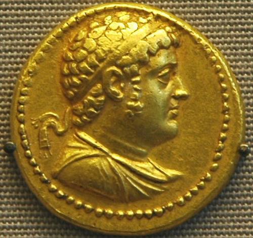 Ptolemy IV Philopator with radiant crown, gold octadrachm. Metropolitan