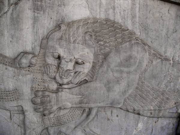 Persepolis, Apadana, East Stairs, Northern part, Lion attacking a bull
