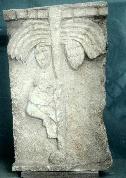 Bani Walid, Relief of a man climbing a palm tree