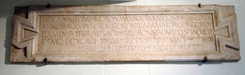 Lepcis, Theater, entrance inscription (IRT 321)
