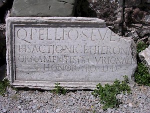 Latin inscription (AE 1973, 503) mentioning a honorary member of the decurional order.