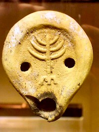 Fourth-century oil lamp with a Menorah