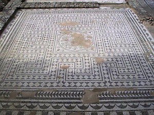 A meandering floor mosaic in Italica