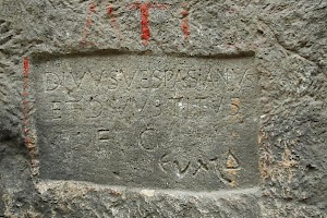 Inscription at the entrance of the tunnel: a dedication to Vespasian and Titus