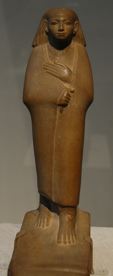 Statuette of a cloaked man