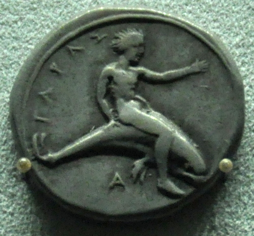 Coin of Taras on a dolphin