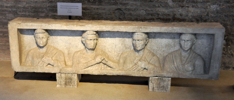 Rome, Via Appia, Relief of four men