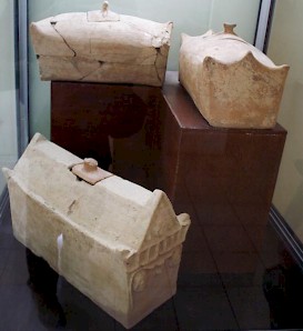 Stone, house shaped urns